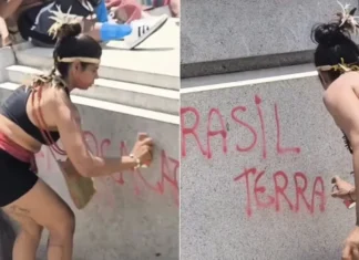 Mulher é detida por pichar monumento durante protesto da esquerda